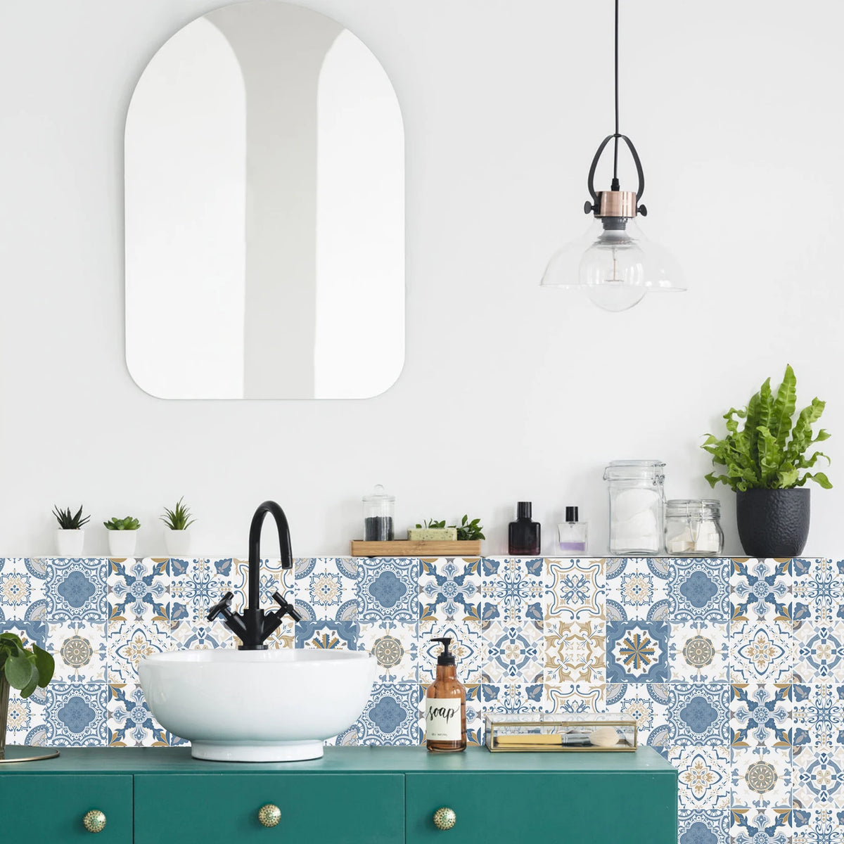 Blue and white tile stickers along a bathroom vanity
